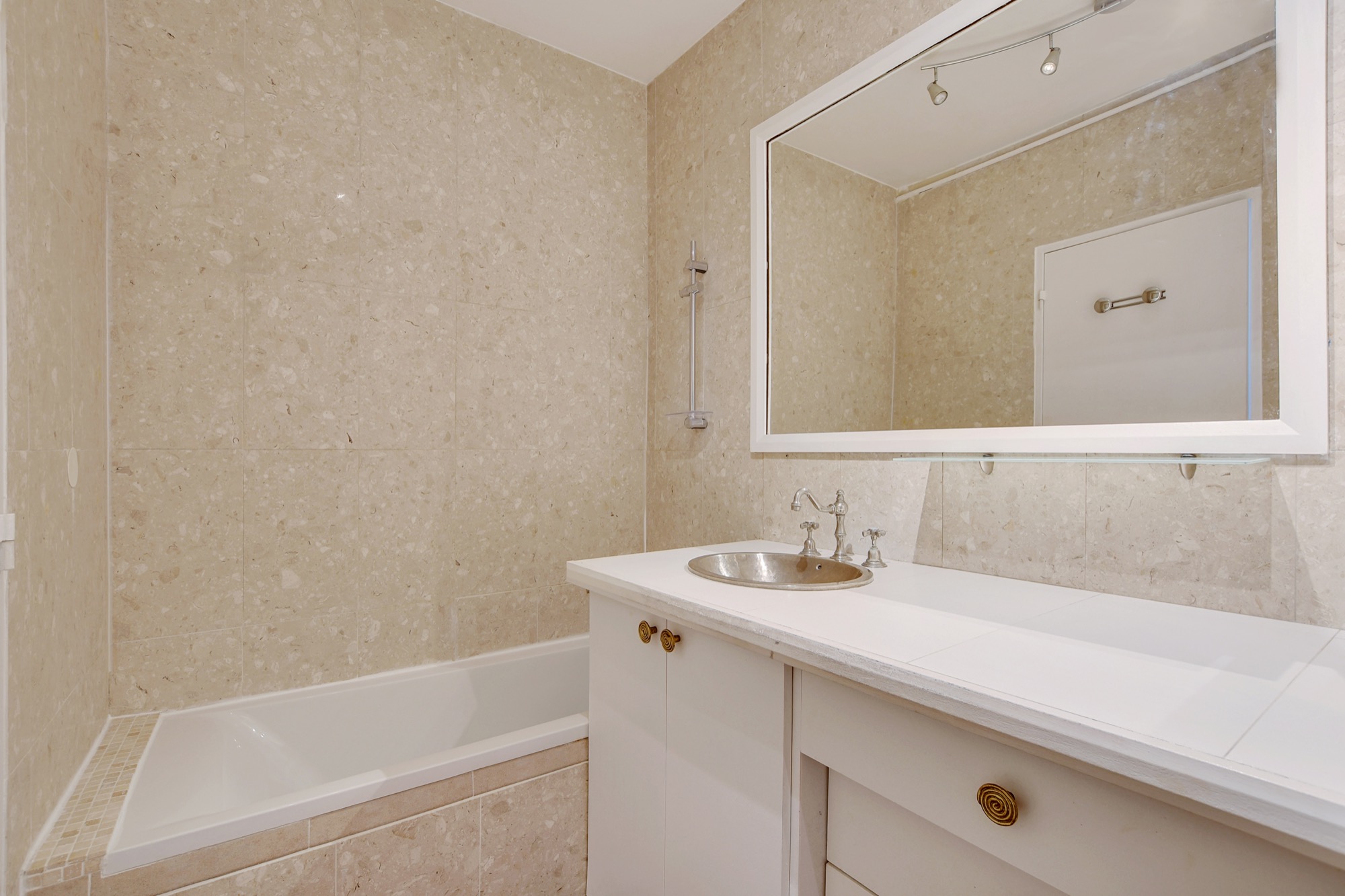 Marble bathroom with bathtub